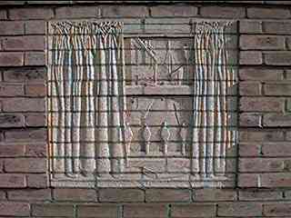 A window in carved brick